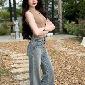 Young woman in casual jeans and top