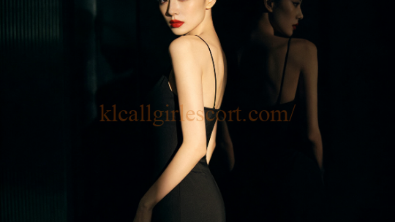Elegant woman in black dress, red lipstick. KL Escort style.