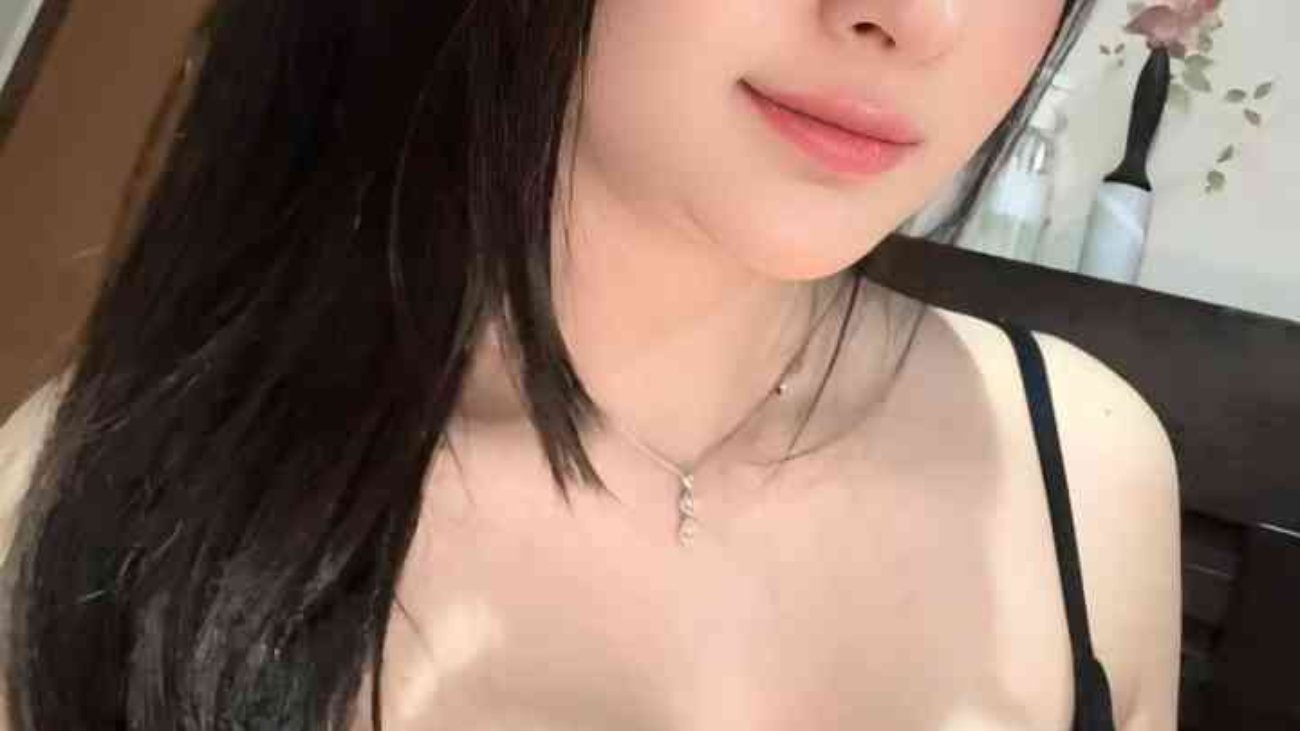 Attractive woman in black top. KL Call Girl Escort.